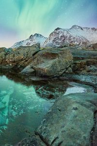 Preview wallpaper northern lights, mountains, rocks, lake, snowy