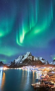 Preview wallpaper northern lights, mountains, snow, snowy, coast, houses