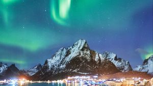 Preview wallpaper northern lights, mountains, snow, snowy, coast, houses