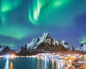 Preview wallpaper northern lights, mountains, snow, snowy, coast, houses