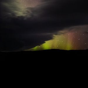 Preview wallpaper northern lights, night, clouds, stars, dark