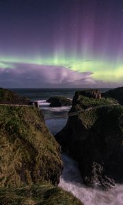 Preview wallpaper northern lights, rocks, bridge, sea, storm