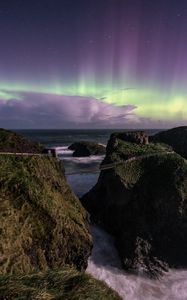 Preview wallpaper northern lights, rocks, bridge, sea, storm