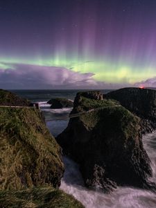 Preview wallpaper northern lights, rocks, bridge, sea, storm