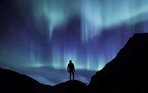 Preview wallpaper northern lights, silhouette, mountains, starry sky, phenomenon