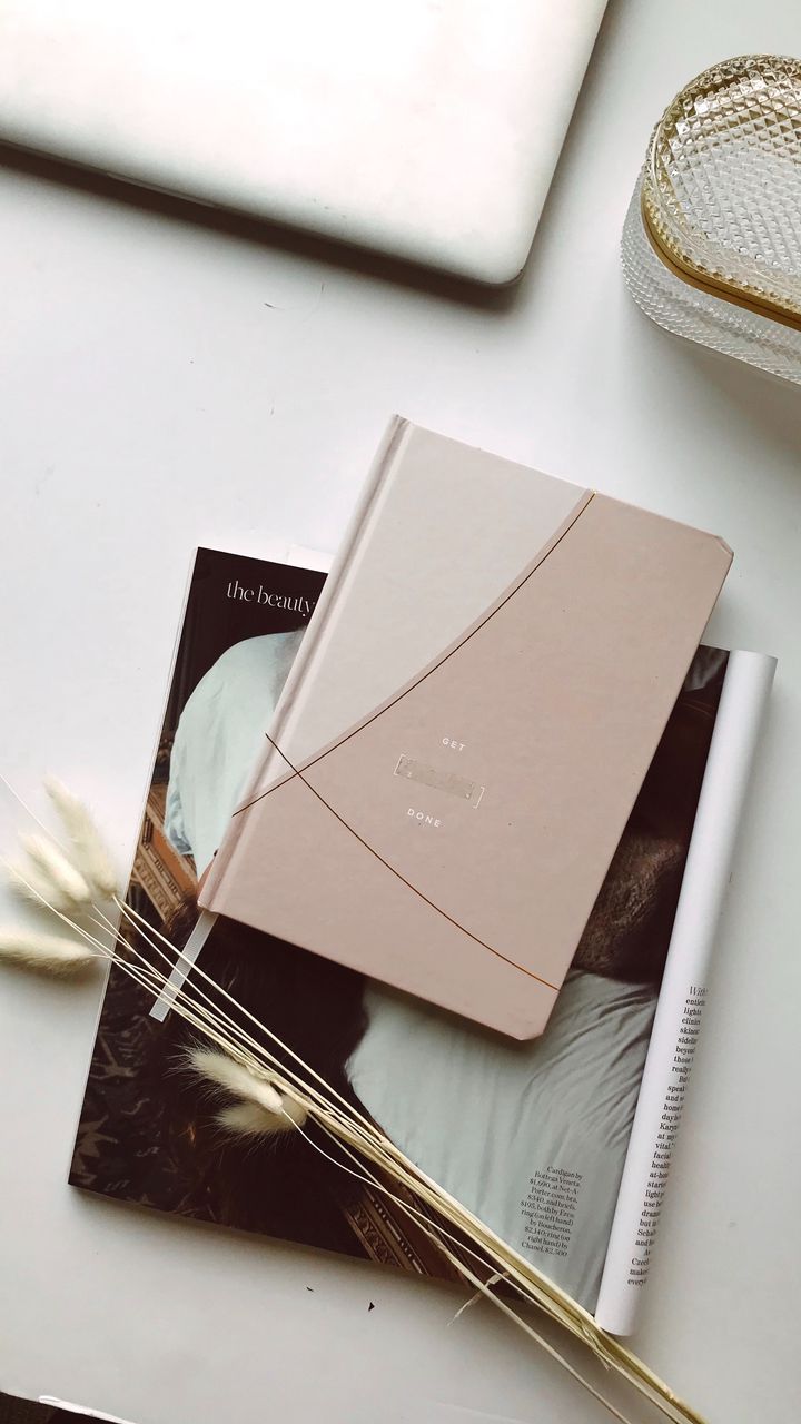 720x1280 Wallpaper notebook, magazine, bouquet, ears, aesthetics