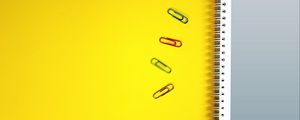 Preview wallpaper notebook, paper clips, surface, yellow