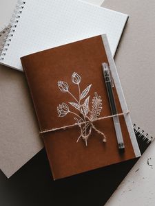 Preview wallpaper notebook, pen, flowers, paper