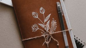 Preview wallpaper notebook, pen, flowers, paper
