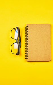 Preview wallpaper notepad, glasses, yellow