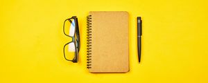 Preview wallpaper notepad, glasses, yellow