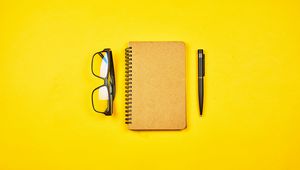 Preview wallpaper notepad, glasses, yellow