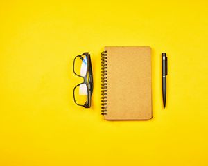 Preview wallpaper notepad, glasses, yellow