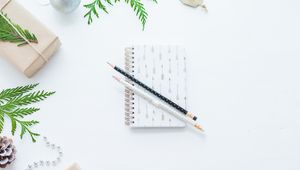 Preview wallpaper notepad, pencils, pine needles, white