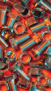 Preview wallpaper nuts, bolts, metal, orange background