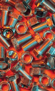 Preview wallpaper nuts, bolts, metal, orange background