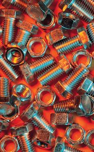 Preview wallpaper nuts, bolts, metal, orange background