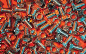 Preview wallpaper nuts, bolts, metal, orange background