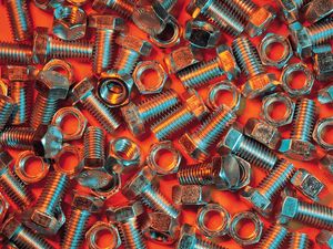 Preview wallpaper nuts, bolts, metal, orange background