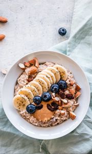 Preview wallpaper oatmeal, berries, fruits, nuts, breakfast