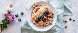 Preview wallpaper oatmeal, berries, fruits, nuts, breakfast