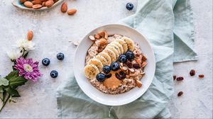 Preview wallpaper oatmeal, berries, fruits, nuts, breakfast