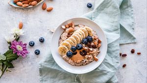 Preview wallpaper oatmeal, berries, fruits, nuts, breakfast