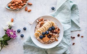 Preview wallpaper oatmeal, berries, fruits, nuts, breakfast