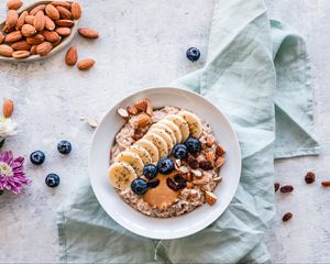 Preview wallpaper oatmeal, berries, fruits, nuts, breakfast