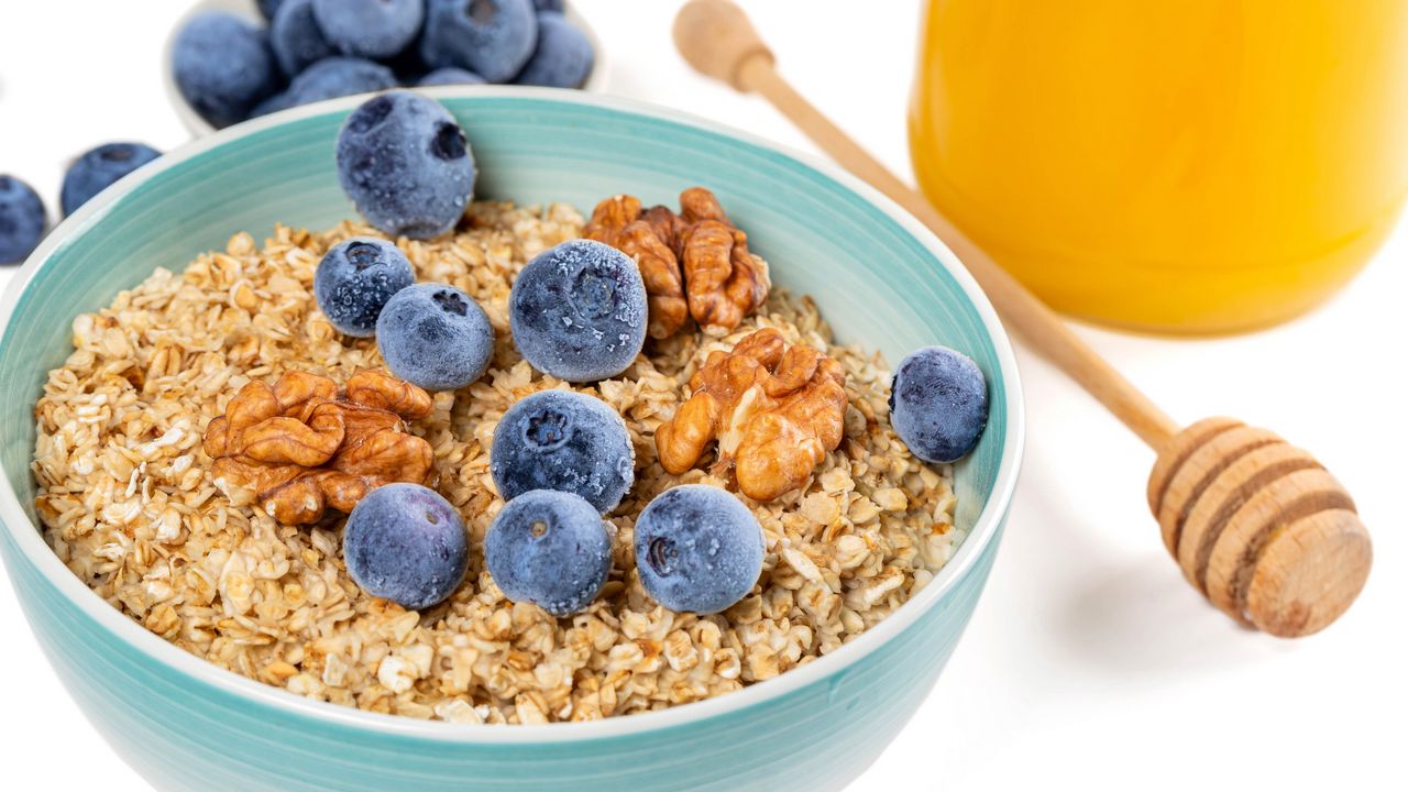 Wallpaper oatmeal, berries, nuts, bowl, breakfast