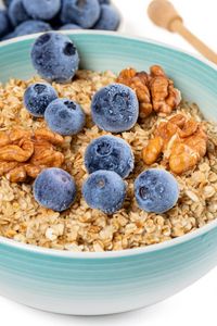 Preview wallpaper oatmeal, berries, nuts, bowl, breakfast