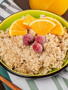 Preview wallpaper oatmeal, porridge, berries, fruit, bowl, breakfast