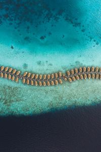 Preview wallpaper ocean, aerial view, bungalow, maldives