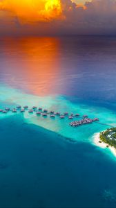 Preview wallpaper ocean, aerial view, bungalow, island, beach, horizon