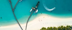 Preview wallpaper ocean, aerial view, coast, bungalow, palm trees