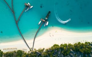 Preview wallpaper ocean, aerial view, coast, bungalow, palm trees