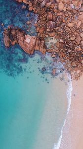 Preview wallpaper ocean, aerial view, stones, water, sand