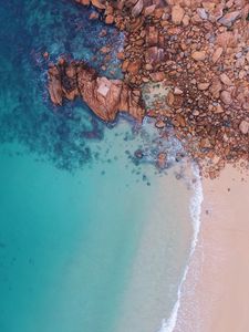 Preview wallpaper ocean, aerial view, stones, water, sand
