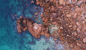 Preview wallpaper ocean, aerial view, stones, water, sand