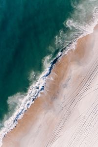 Preview wallpaper ocean, aerial view, surf, sand, foam, water, beach