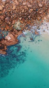 Preview wallpaper ocean, aerial view, water, stones, sand, foam