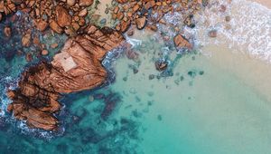 Preview wallpaper ocean, aerial view, water, stones, sand, foam