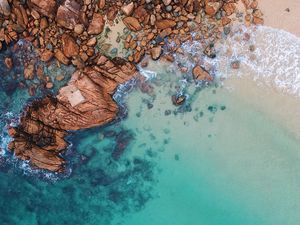 Preview wallpaper ocean, aerial view, water, stones, sand, foam