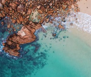 Preview wallpaper ocean, aerial view, water, stones, sand, foam