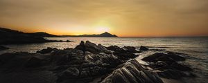 Preview wallpaper ocean, beach, rocks, sunset, dark