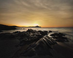 Preview wallpaper ocean, beach, rocks, sunset, dark