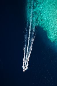 Preview wallpaper ocean, boat, trail, waves, aerial view