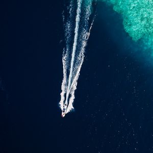 Preview wallpaper ocean, boat, trail, waves, aerial view