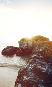 Preview wallpaper ocean, boats, rocks, shore, sunlight