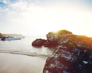 Preview wallpaper ocean, boats, rocks, shore, sunlight